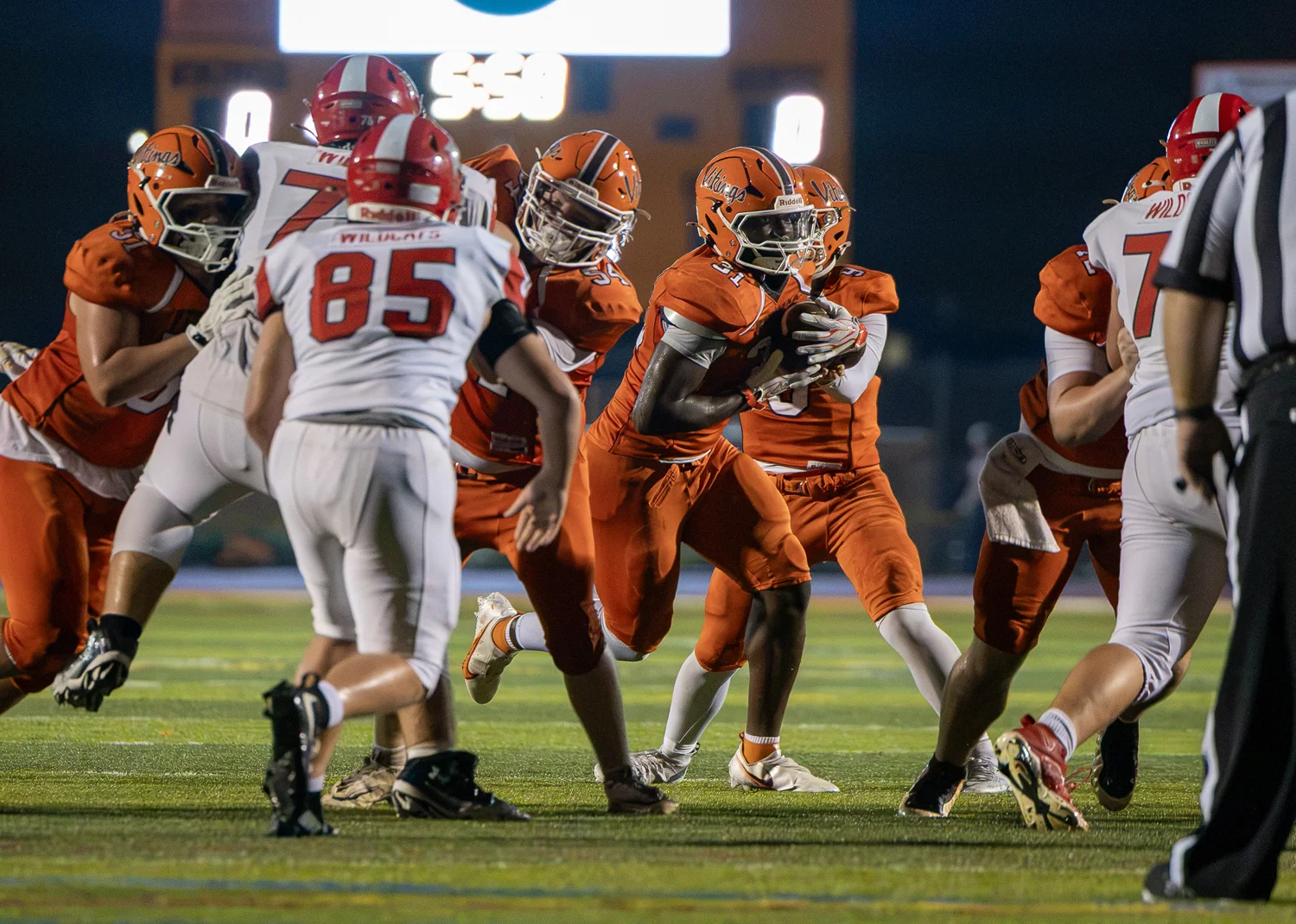 RB getting the handoff from the QB