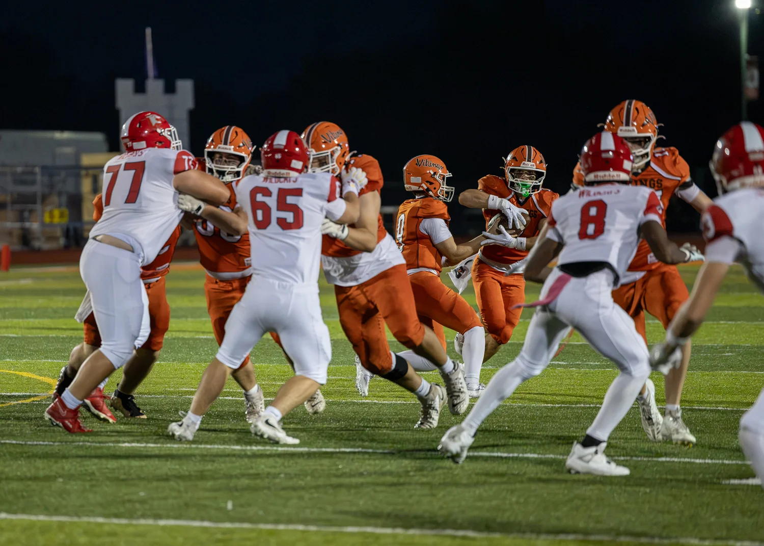 Offense with the handoff to the RB