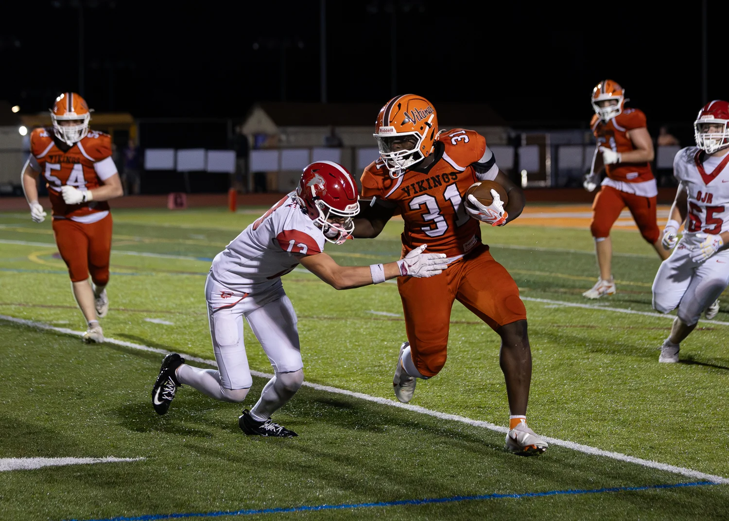 RB with the stiff arm