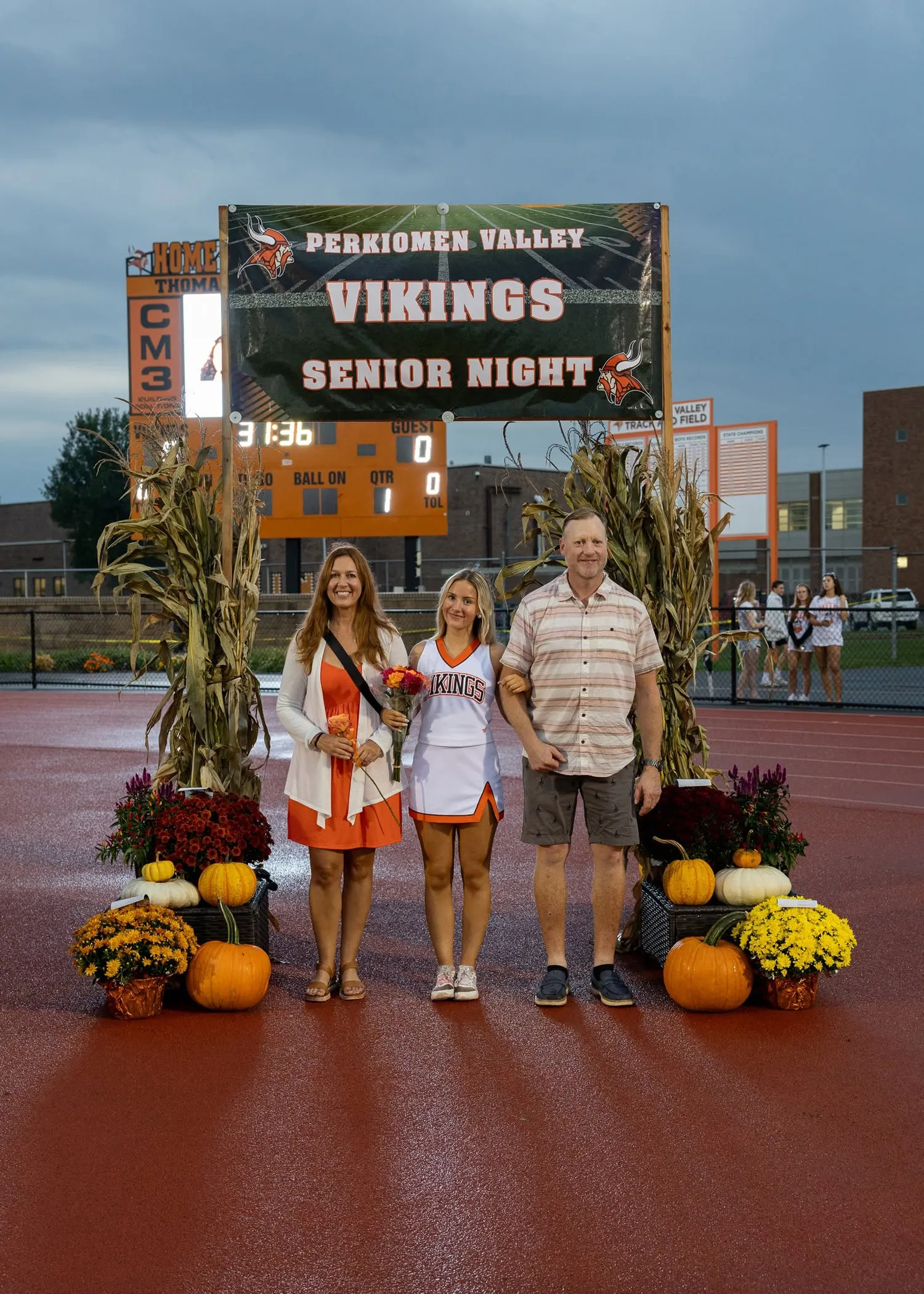 Cheerleader with Family