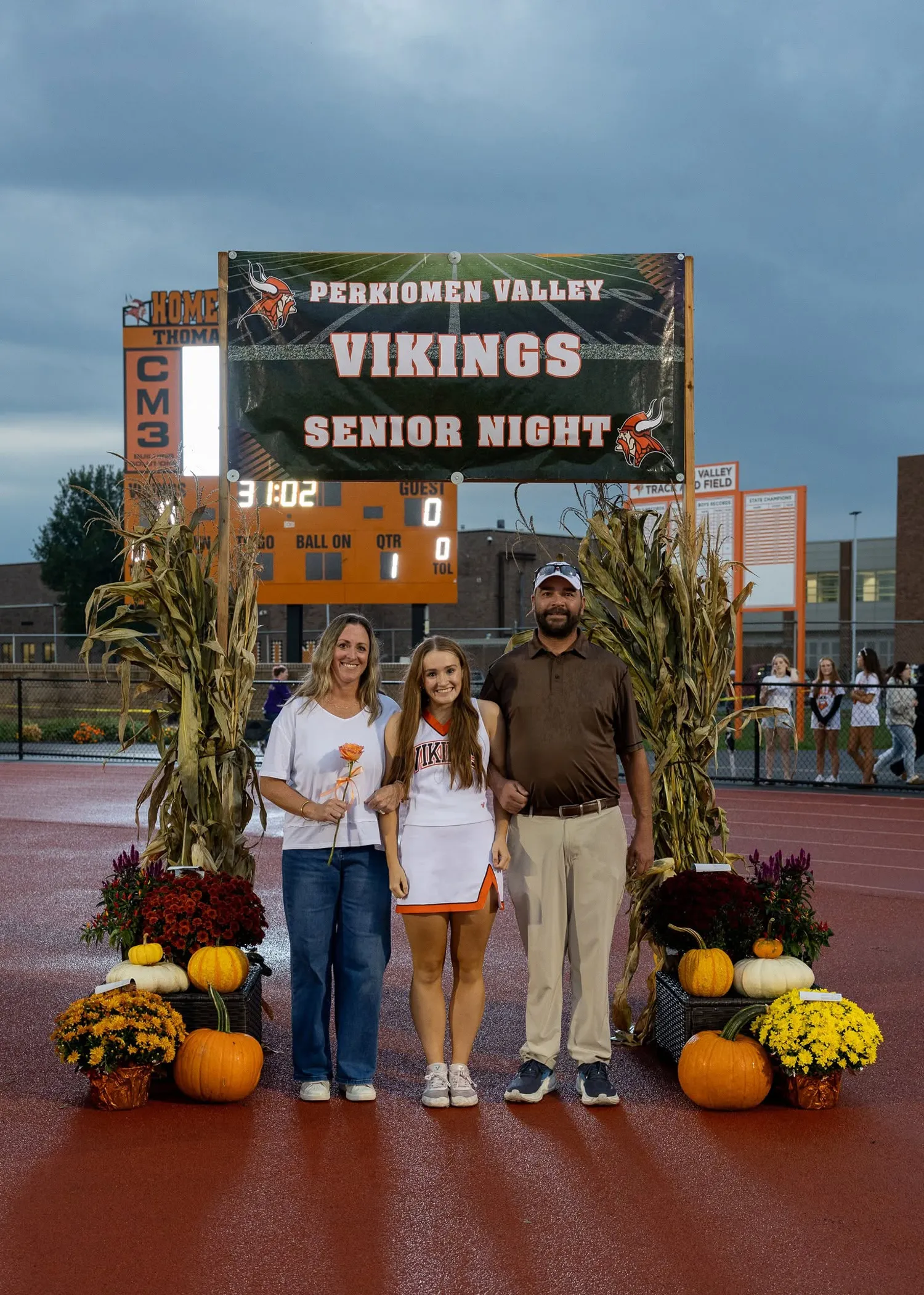 Cheerleader with Family