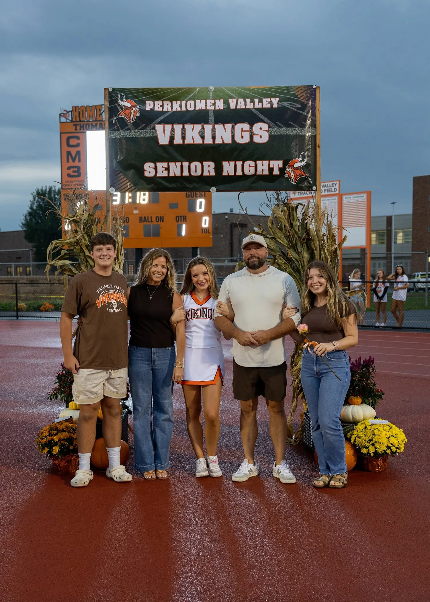 Cheerleader with her family